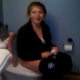 A girl is video-recorded as she poops while sitting on a toilet. Although we miss the plop, her finished product is briefly visible in the toilet at the end of the clip before she closes the lid and flushes.